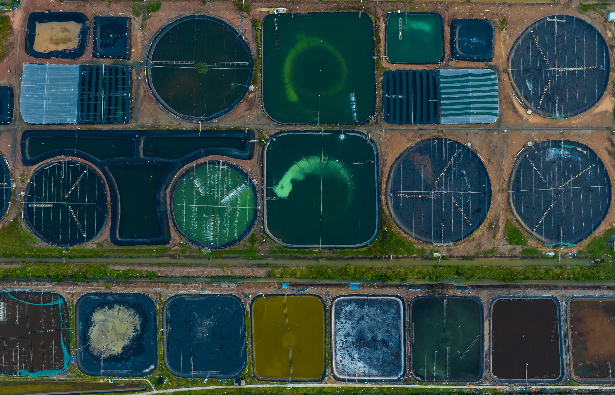 Aerial view of industrial water treatment and pond systems
