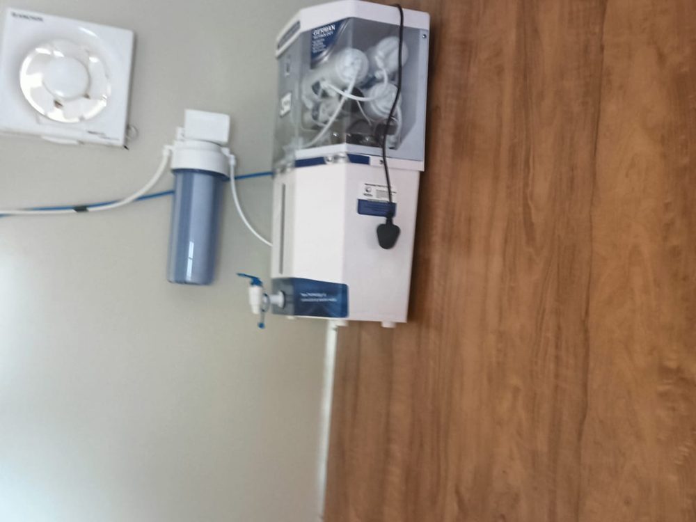RO purifier with pre-filter mounted on wall
