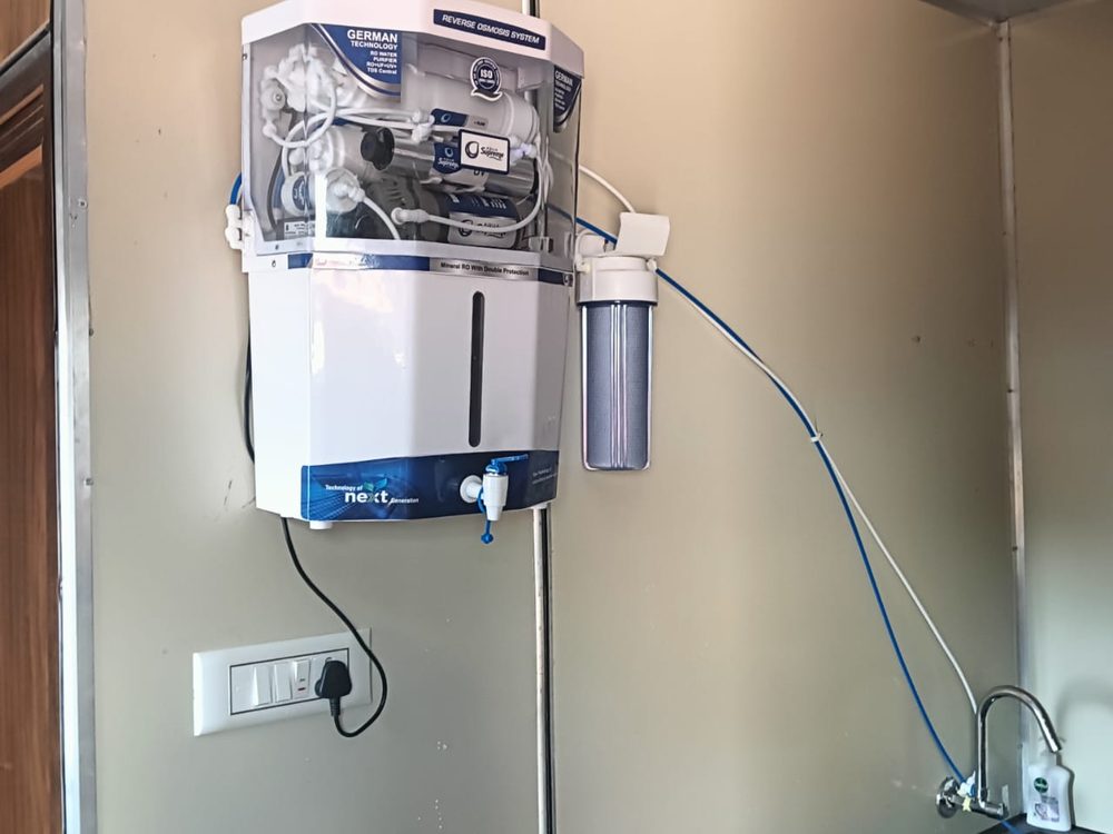 Compact RO purifier mounted above kitchen counter