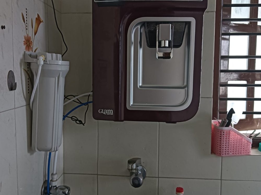 Water dispenser with hot and cold taps installed in home